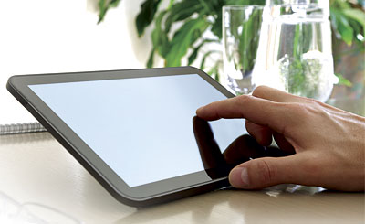 Finger touching screen of a digital tablet